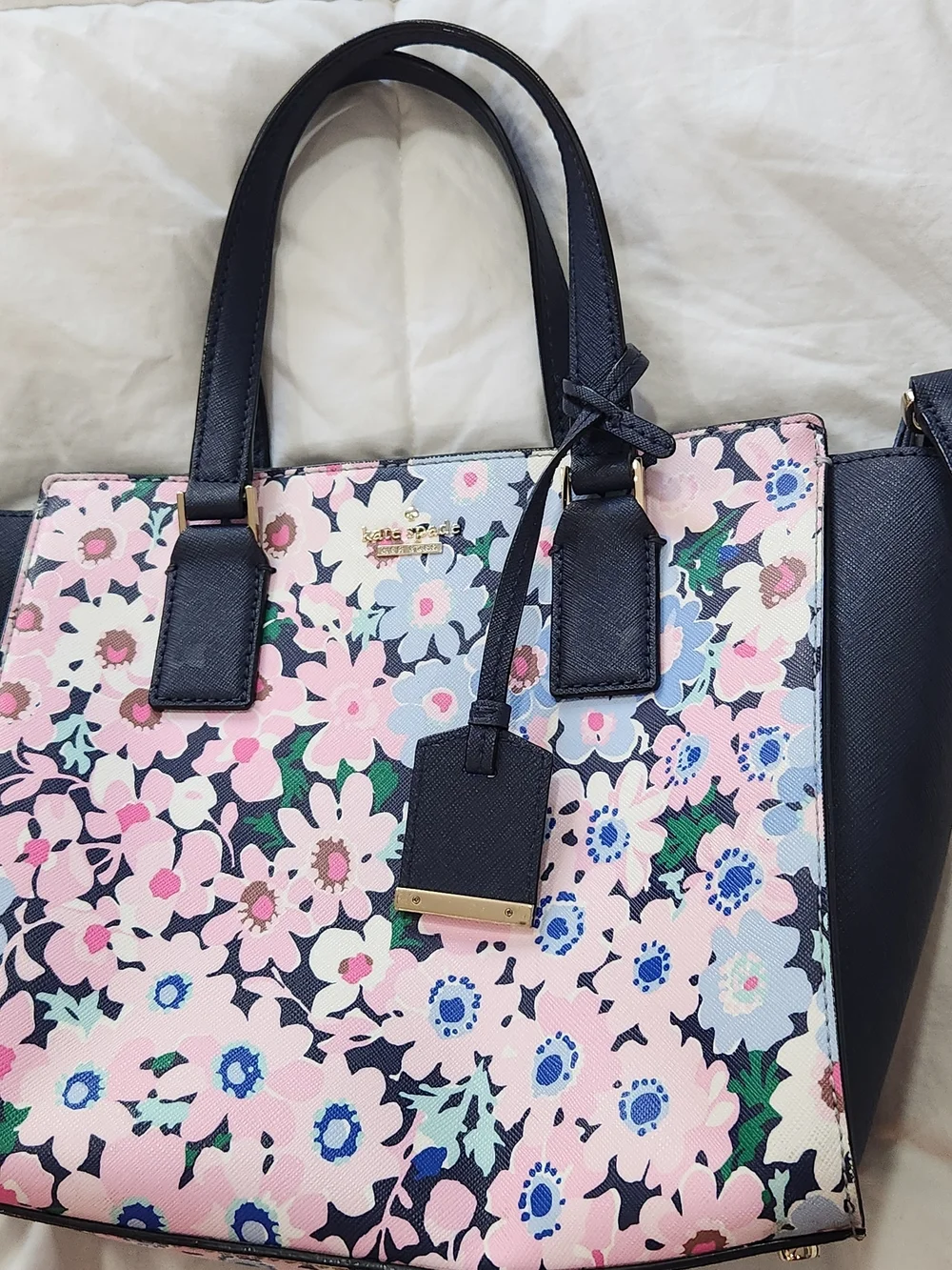 Kate Spade Cameron Street Small Hayden Satchel in a floral pattern
